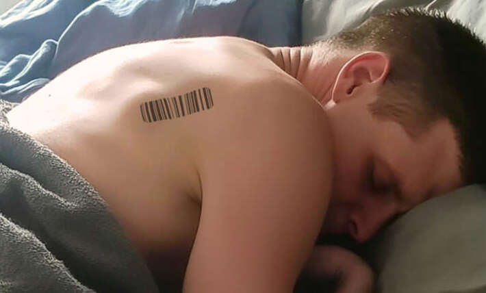 I found a barcode on my husband’s back, then I scanned it and fainted