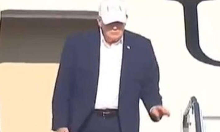 Donald Trump fans say ‘something’s up’ as he struggles with Air Force One stairs
