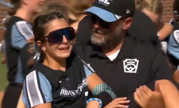 Man speaks out after carrying injured daughter to celebrate Little League title win — here’s what he told her in viral moment