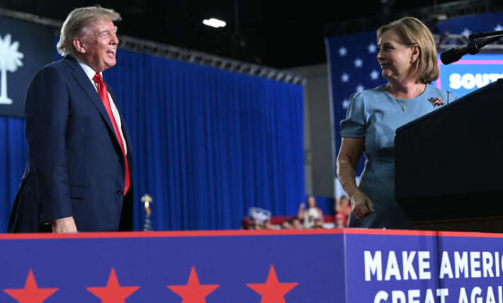 Crowd boos mention of Trump in losing Republican’s concession speech