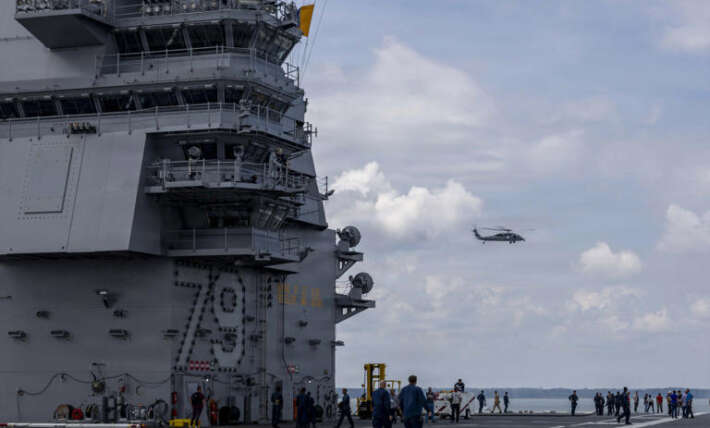 Sailor charged with murder in shooting death aboard USS John F Kennedy