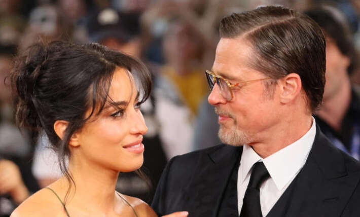 Brad Pitt’s younger girlfriend, 33, turns heads in plunging gown