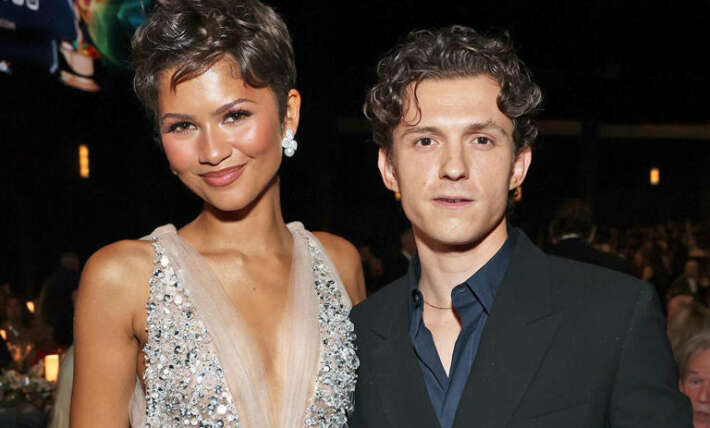 Zendaya stuns in gown dripping with crystals alongside Tom Holland during rare date night at the Emmys