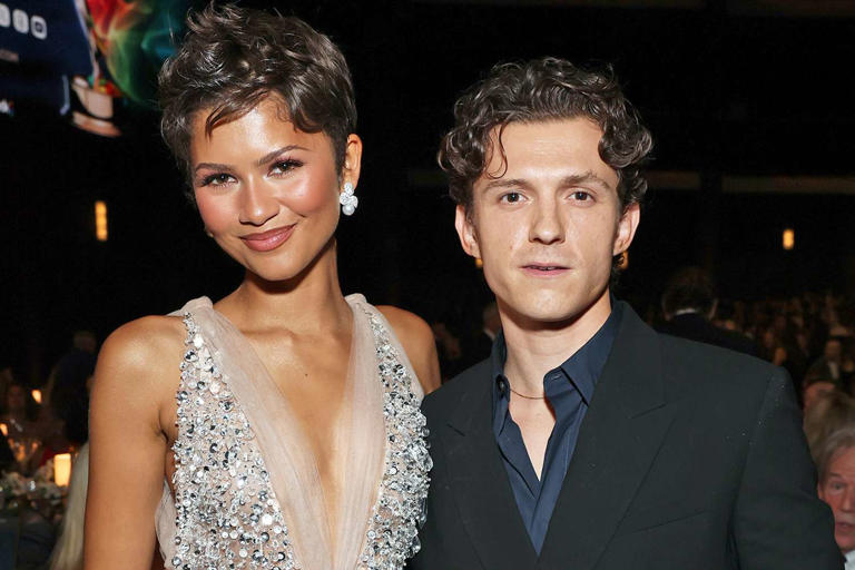 Zendaya stuns in gown dripping with crystals alongside Tom Holland during rare date night at the Emmys