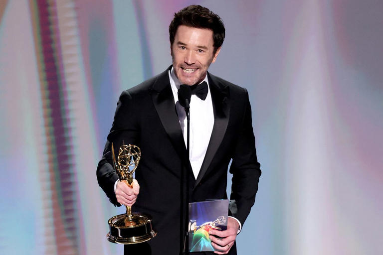 Tom Pelphrey shouts out ‘very pregnant’ fiancée Kaley Cuoco as she tears up during his 2026 Emmys win