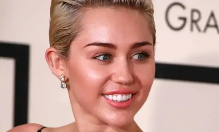 Miley Cyrus drops jaws in leather look at the iHeartRadio Music Awards