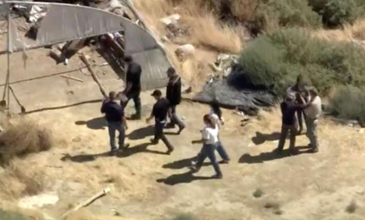 Frantic grave-digging effort in California desert uncovers human remains sparking murder investigation two weeks after man goes missing