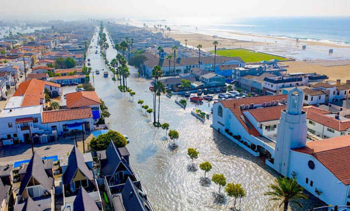 Hurricane Rachel obliterates 20-foot berms and turns Newport Beach streets into the Pacific (aerial footage)