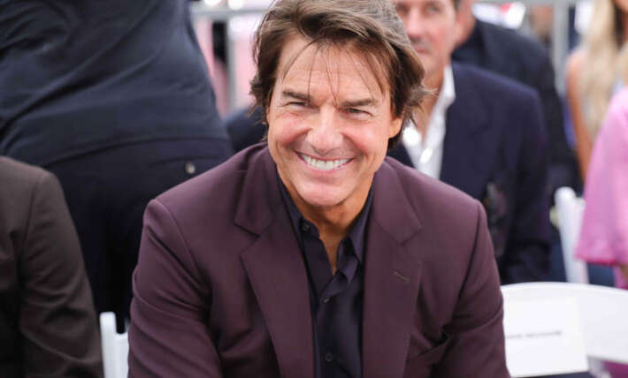 Tom Cruise looks unrecognizable with stark white hair and facial prosthetics
