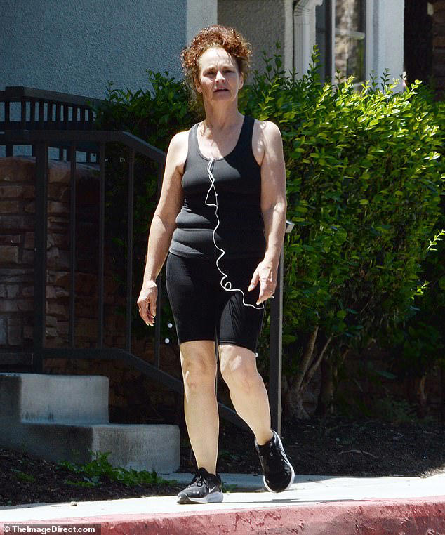 Actress who appeared in 80s comedies seen on rare LA outing with husband, can you guess who?
