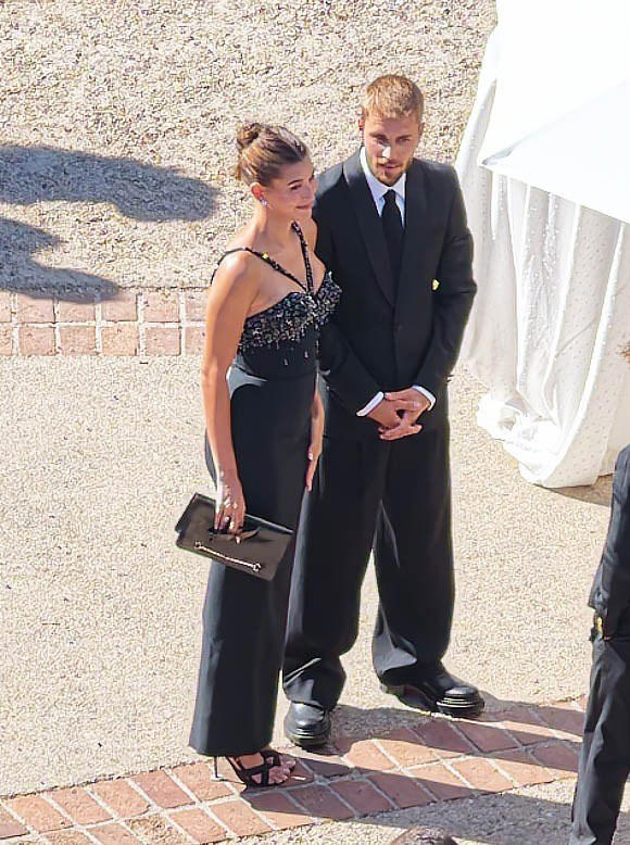 Hailey Bieber glitters at Jordyn Woods’ wedding in Versace dress first worn by Naomi Campbell
