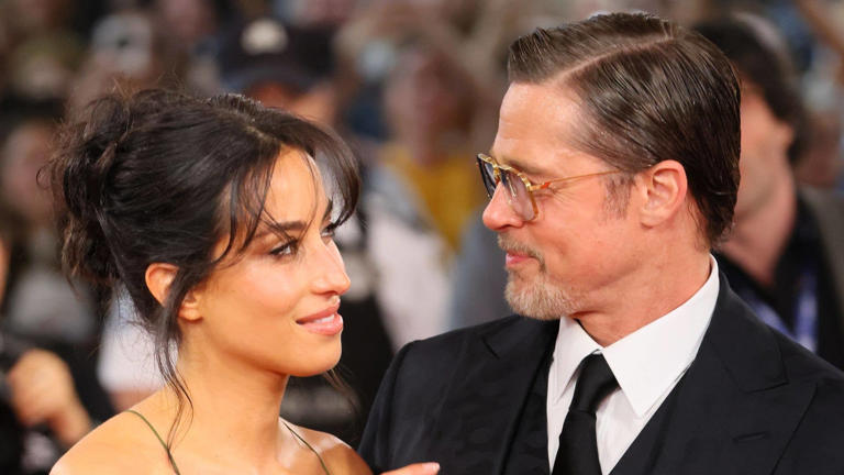 Brad Pitt’s younger girlfriend, 33, turns heads in plunging gown