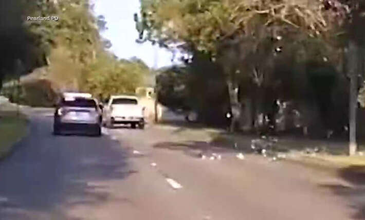 Watch: Florida driver tossed more than $6,000 from a GMC Sierra in a Pearland, Texas chase, then got charged with tampering