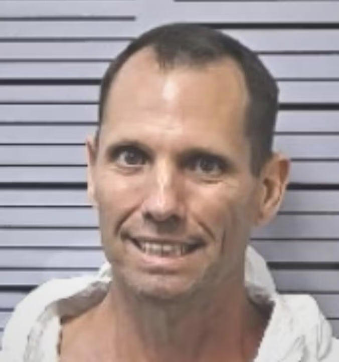 Suspect accused of decapitating relatives using a chainsaw